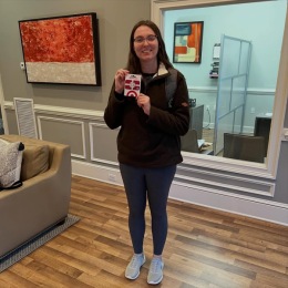 woman holding a piece of paper