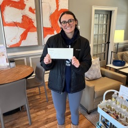 woman holding a piece of paper